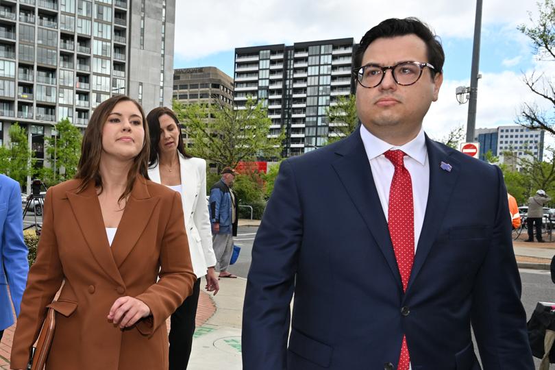 Former Liberal Party staffer Brittany Higgins and partner David Sharaz arrive at the ACT Supreme Court in Canberra, Thursday, October 27, 2022. Former Liberal Party staffer Bruce Lehrmann is accused of raping a colleague Brittany Higgins at Parliament House in 2019. (AAP Image/Mick Tsikas) NO ARCHIVING