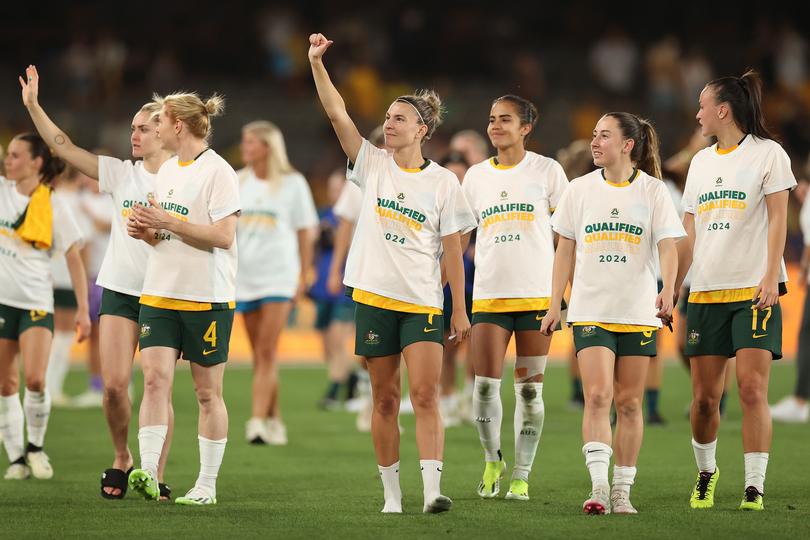 MELBOURNE, AUSTRALIA - FEBRUARY 28: Steph Catley (C) of Australia and team mates thank fans during the AFC Women's Olympic Football Tournament Paris 2024 Asian Qualifier Round 3 match between Australia Matildas and Uzbekistan at Marvel Stadium on February 28, 2024 in Melbourne, Australia. (Photo by Kelly Defina/Getty Images)