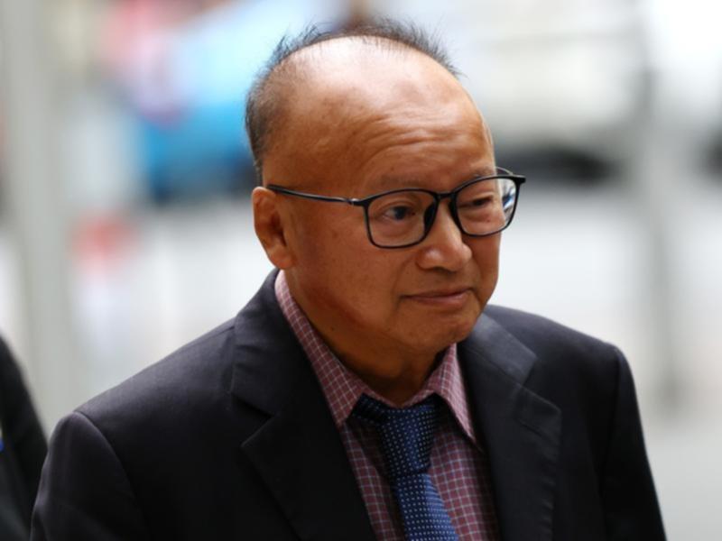 Di Sanh Duong arrives at the County Court of Victoria