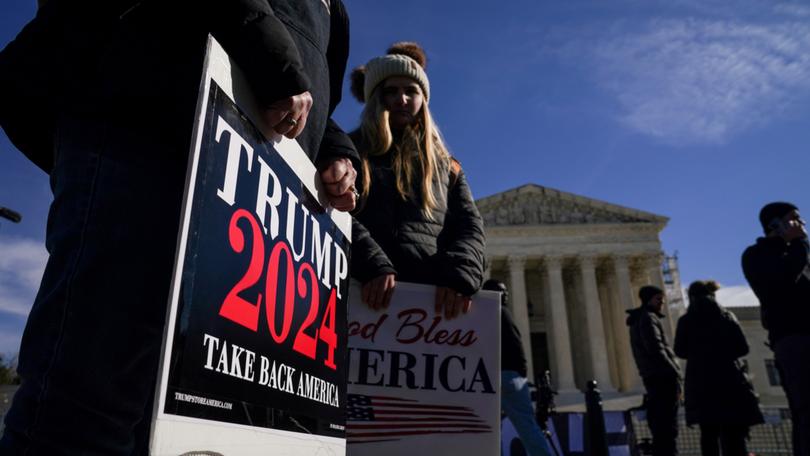 Demonstrators for and against former president Donald Trump protest outside the Supreme Court early this month. MUST CREDIT: Jahi Chikwendiu/The Washington Post