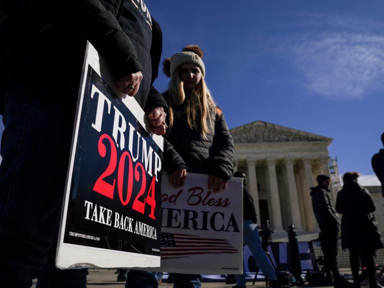 Demonstrators for and against former president Donald Trump protest outside the Supreme Court early this month. MUST CREDIT: Jahi Chikwendiu/The Washington Post