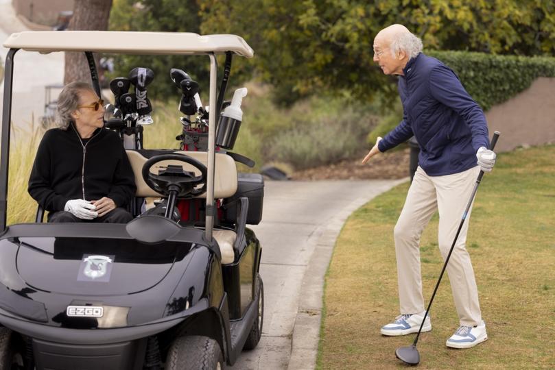 This image released by HBO shows Richard Lewis, left, and Larry David in a scene from Season 12 of "Curb Your Enthusiasm." Lewis, an acclaimed comedian known for exploring his neuroses in frantic, stream-of-consciousness diatribes while dressed in all-black, leading to his nickname “The Prince of Pain,” has died. He was 76. He died at his home in Los Angeles on Tuesday night after suffering a heart attack, according to his publicist Jeff Abraham.  (John P. Johnson/HBO via AP)