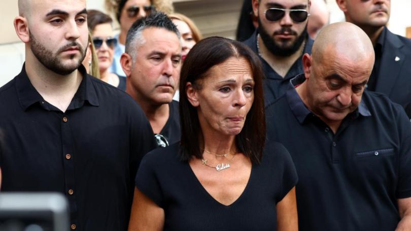 Aggie Di Mauro (middle) is devastated her daughter's killer did not get life in jail. (Con Chronis/AAP PHOTOS)