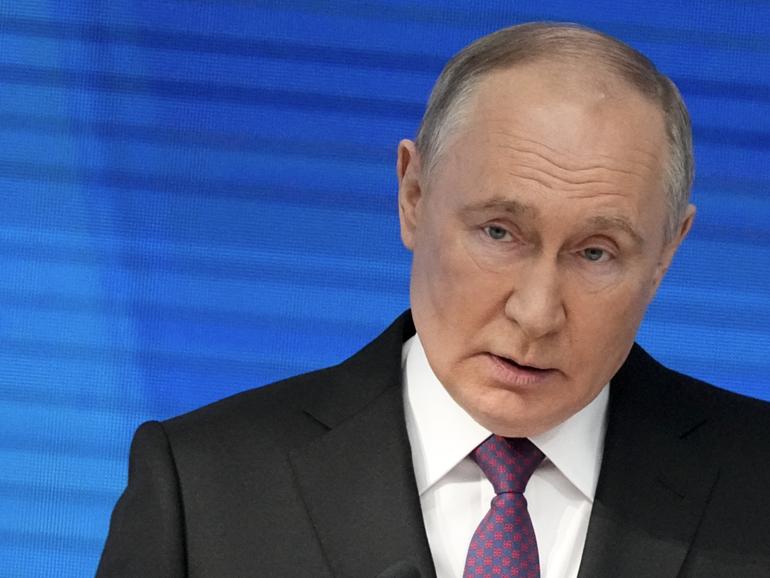 Russian President Vladimir Putin delivers his state-of-the-nation address in Moscow, Russia.