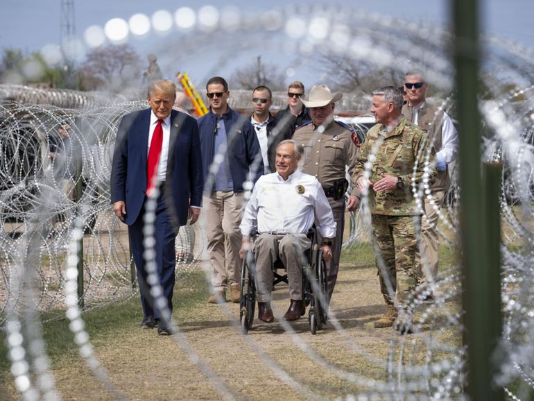 Former President Donald Trump and Texas Gov. Greg Abbott meet with members of the Texas National Guard.