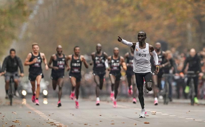 Eliud Kipchoge runs on his way to break the historic two hour barrier for a marathon in Vienna, Saturday, Oct. 12, 2019. Eliud Kipchoge has become the first athlete to run a marathon in less than two hours, although it will not count as a world record. The Olympic champion and world record holder from Kenya clocked 1 hour, 59 minutes and 40 seconds Saturday at the INEOS 1:59 Challenge, an event set up for the attempt. (Jed Leicester/The INEOS 1:59 Challenge via AP)
