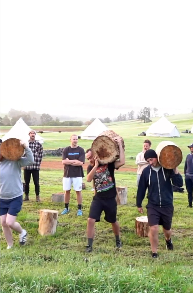 A group of men take part in a bonding exercise on a Chilly Willys retreat.