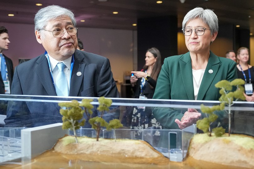 MELBOURNE, AUSTRALIA - MARCH 04: Secretary of Foreign Affairs of Philippines Enrique Manalo (Left) and Minister for Foreign Affairs Penny Wong (Right) viewing a display during the ASEAN-Australia Special Summit on March 04, 2024 in Melbourne, Australia. Southeast Asian leaders are gathered for talks that run through March 6 on a wide range of topics, including clean energy cooperation and China's aggressive stance in the South China Sea.  (Photo by Asanka Ratnayake/Getty Images)