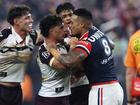 Spencer Leniu (r) of the Roosters exchanges heated words with Kotoni Staggs. Leniu has been charged for making an alleged racist slur towards Brisbane’s Ezra Mam.