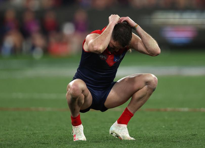 MELBOURNE, AUSTRALIA - SEPTEMBER 15: Joel Smith of the Demons is dejected after the Demons were defeated by the Blues during the AFL First Semi Final match between Melbourne Demons and Carlton Blues at Melbourne Cricket Ground, on September 15, 2023, in Melbourne, Australia. (Photo by Robert Cianflone/Getty Images via AFL Photos)