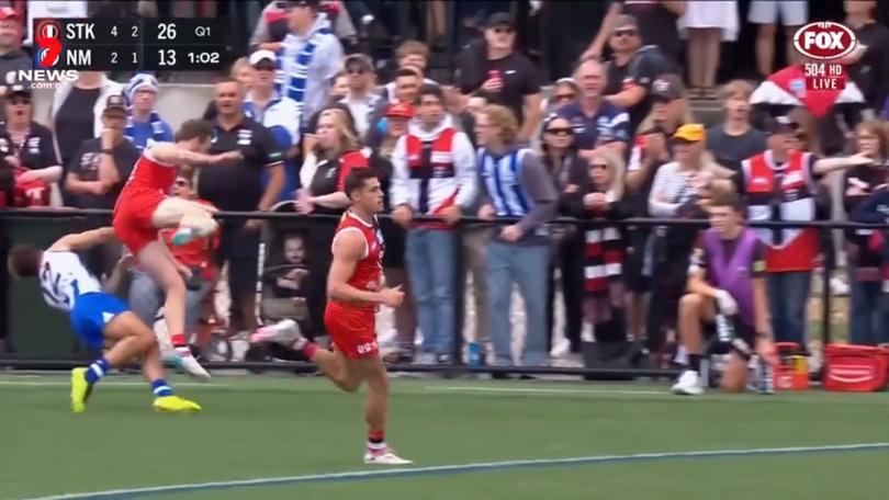 St Kilda’s Jimmy Webster knocks out North Melbourne’s Jy Simpkin.