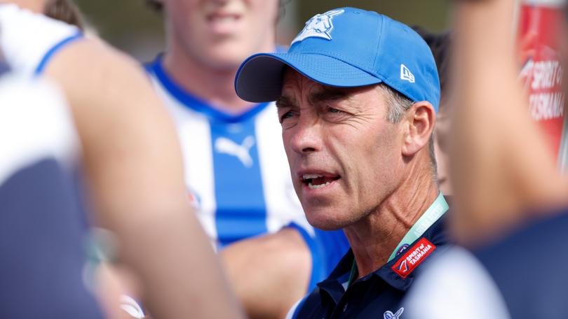 MELBOURNE, AUSTRALIA - MARCH 03: Alastair Clarkson, Senior Coach of the Kangaroos addresses his players during the 2024 AFL AAMI Community Series match between the St Kilda Saints and North Melbourne Kangaroos at RSEA Park on March 03, 2024 in Melbourne, Australia. (Photo by Dylan Burns/AFL Photos)