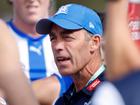 MELBOURNE, AUSTRALIA - MARCH 03: Alastair Clarkson, Senior Coach of the Kangaroos addresses his players during the 2024 AFL AAMI Community Series match between the St Kilda Saints and North Melbourne Kangaroos at RSEA Park on March 03, 2024 in Melbourne, Australia. (Photo by Dylan Burns/AFL Photos)