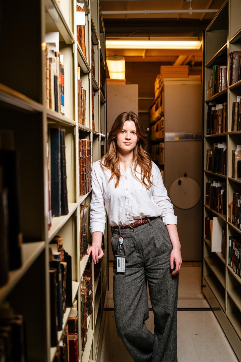 Jen Vos, a 33-year-old archivist for Calvin College is still paying down her undergraduate school loans.