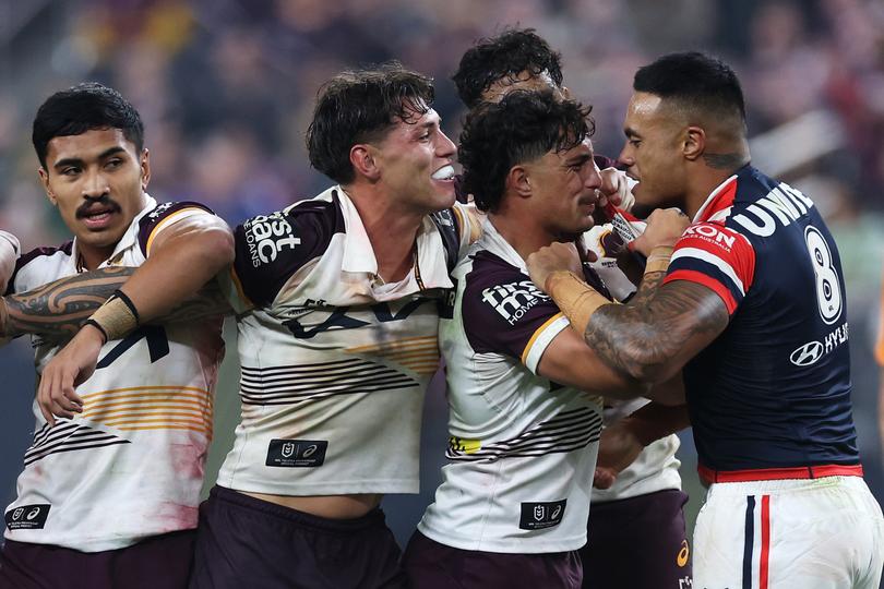 LAS VEGAS, NEVADA - MARCH 02: Spencer Leniu (r) of the Roosters exchanges heated words with Kotoni Staggs of the Broncos during the round one NRL match between Sydney Roosters and Brisbane Broncos at Allegiant Stadium, on March 02, 2024, in Las Vegas, Nevada. (Photo by Ezra Shaw/Getty Images)