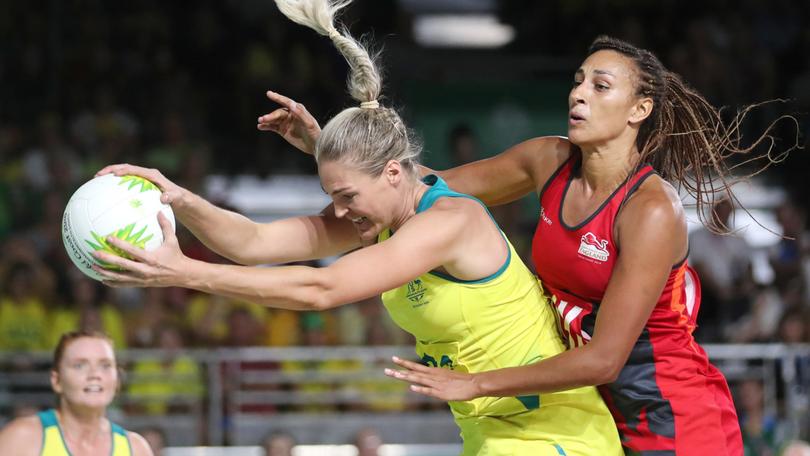 Australian captain Caitlin Bassett and England's Geva Mentor. 