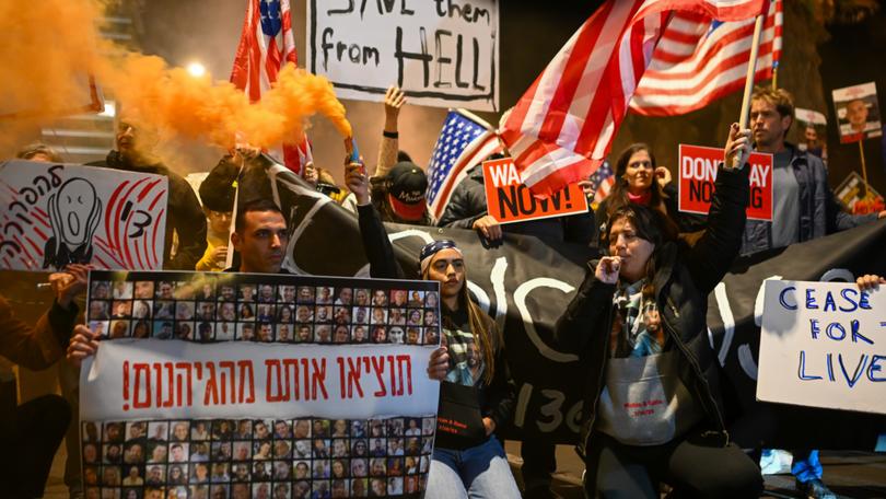 TEL AVIV, ISRAEL - MARCH 5: Protestors led by the families of hostages call on US President Joe Biden and the U.S. administration to secure a hostage deal ahead of Ramadan outside the U.S. Embassy Branch in Tel Aviv on March 5, 2024 in Tel Aviv, Israel. Over the weekend, the vice president of the United States voiced that country's most forceful demand yet that there be an immediate ceasefire in the conflict, imploring Hamas to agree to the a six-week pause in fighting and calling on Israel to increase the flow of aid into the territory.(Photo by Alexi J. Rosenfeld/Getty Images) *** BESTPIX ***