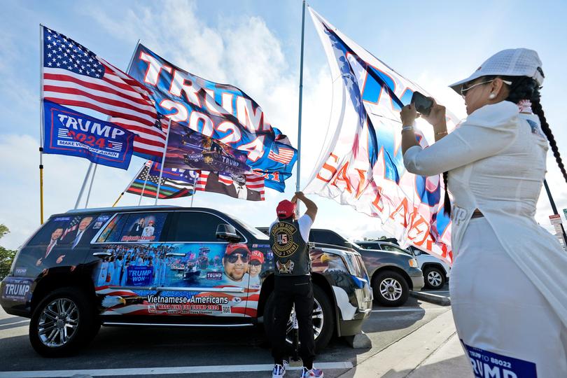 Donald Trump fans show their support near his Mar-a-Lago estate.