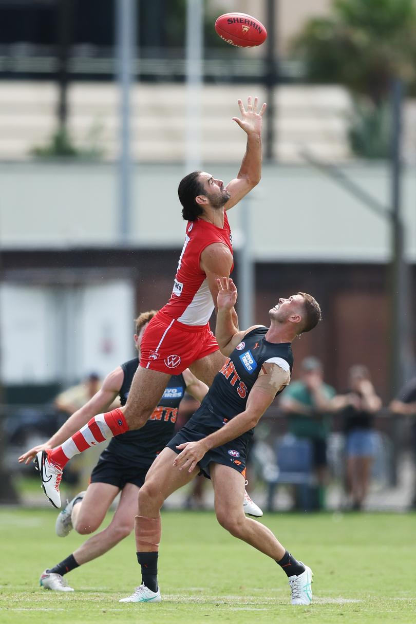 SYDNEY, AUSTRALIA - FEBRUARY 22: Brodie Grundy of the Swans handles the ball during an AFL practice match between Sydney Swans and Greater Western Sydney Giants at Tramway Oval on February 22, 2024 in Sydney, Australia. (Photo by Matt King/Getty Images)
