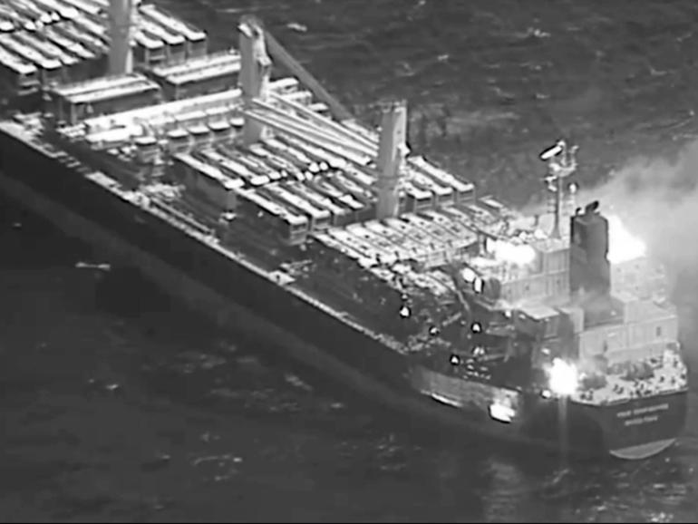 Images from US Central Command showed the cargo vessel on fire.
