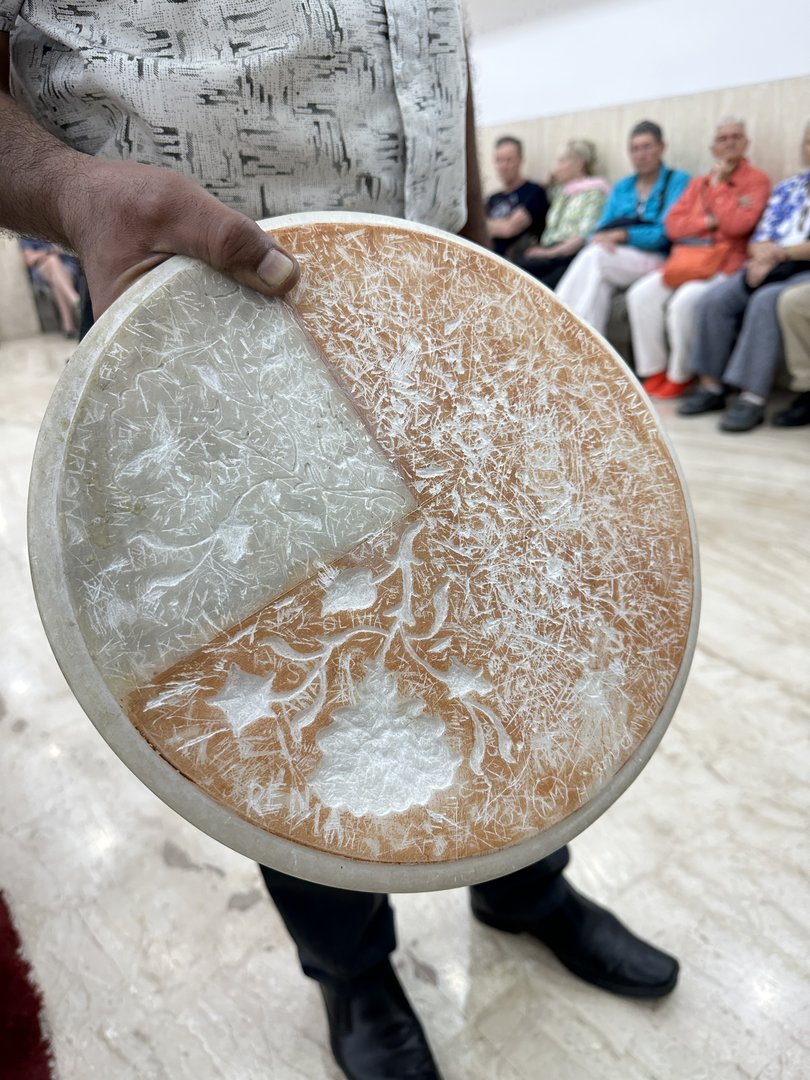 Preparing marble inlay, just as it has always been done.