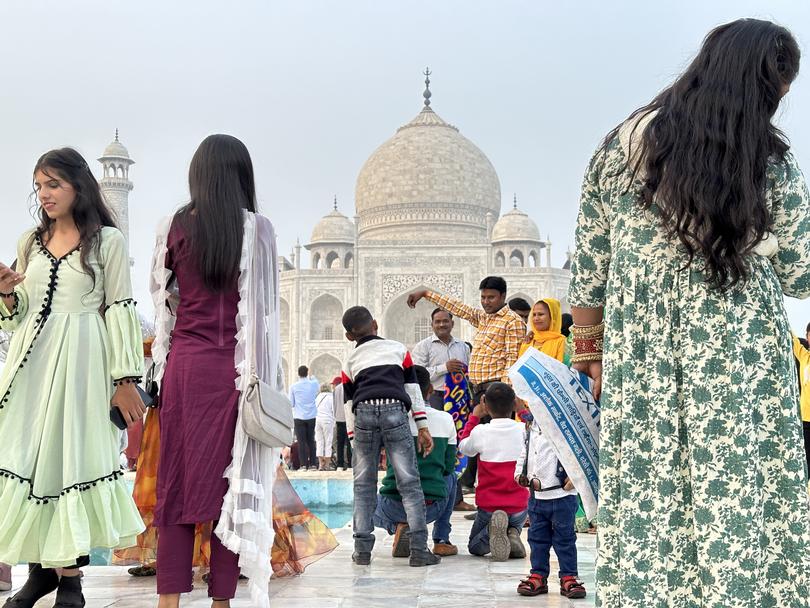 Indians visiting the Taj Mahal.