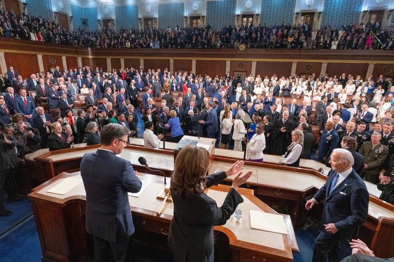 Speaker of the House Mike Johnson and Vice President Kamala Harris applaud as US President Joe Biden arrives to deliver the State of the Union address to a joint session of Congress at the U.S. Capitol, Thursday March 7, 2024, in Washington.     Alex Brandon/Pool via REUTERS