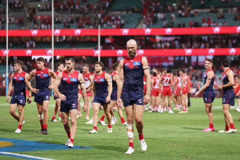 SYDNEY, AUSTRALIA - MARCH 07:  Max Gawn of the Demons and team mates look dejected after the Opening Round AFL match between Sydney Swans and Melbourne Demons at SCG, on March 07, 2024, in Sydney, Australia. (Photo by Matt King/AFL Photos/Getty Images)