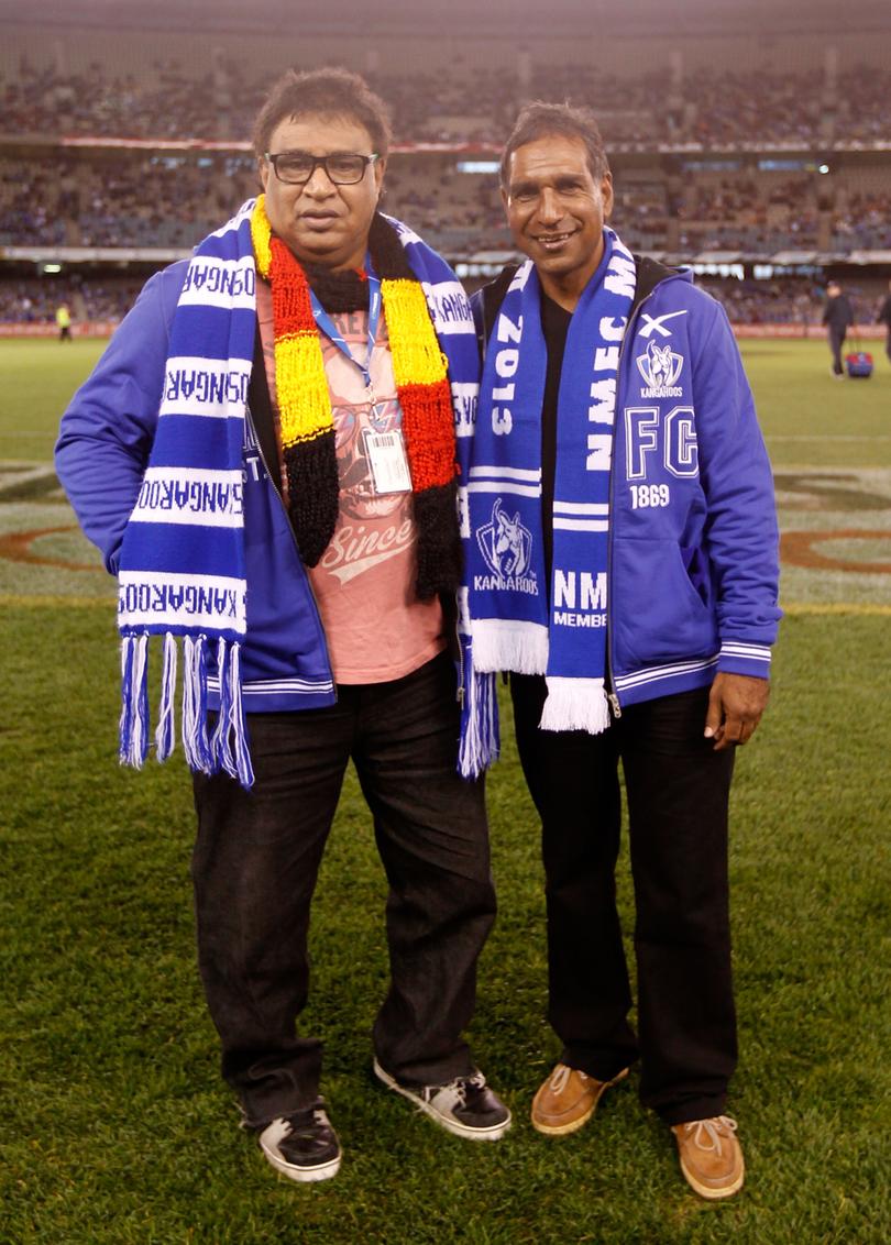 North Melbourne greats Phil and Jimmy Krakouer in 2013.