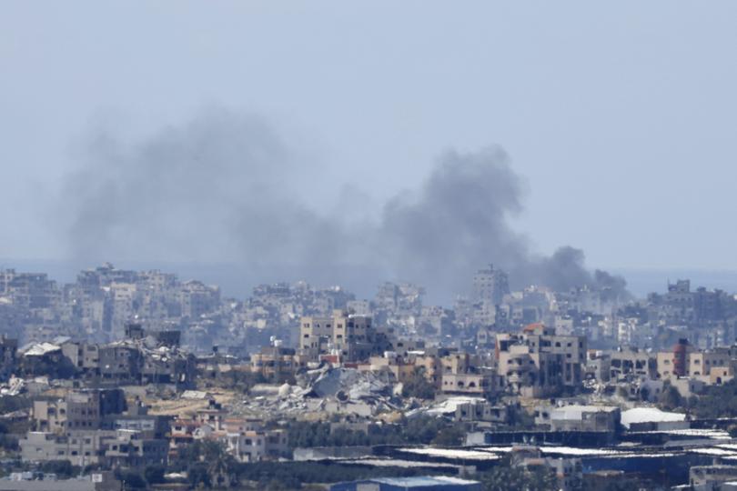 SOUTHERN ISRAEL, ISRAEL - MARCH 10: Smoke rise over Gaza as seen from a position on the Israeli side of the border on March 10, 2024 in southern Israel. Over last weekend, the vice president of the United States voiced that country's most forceful demand yet that there be an immediate ceasefire in the conflict, imploring Hamas to agree to the a six-week pause in fighting and calling on Israel to increase the flow of aid into the territory. (Photo by Amir Levy/Getty Images)