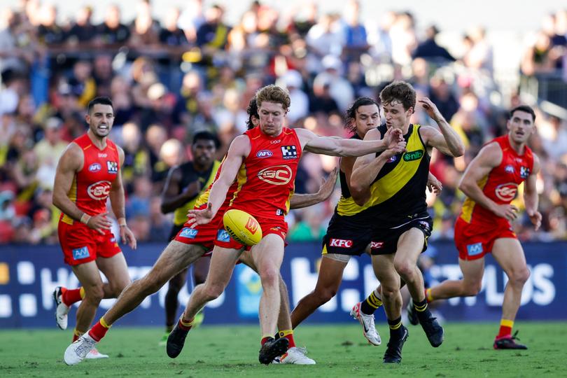 GOLD COAST, AUSTRALIA - MARCH 09: Matt Rowell of the Suns in action during the 2024 AFL Opening Round match between the Gold Coast SUNS and the Richmond Tigers at People First Stadium on March 09, 2024 in Gold Coast, Australia. (Photo by Russell Freeman/AFL Photos via Getty Images)