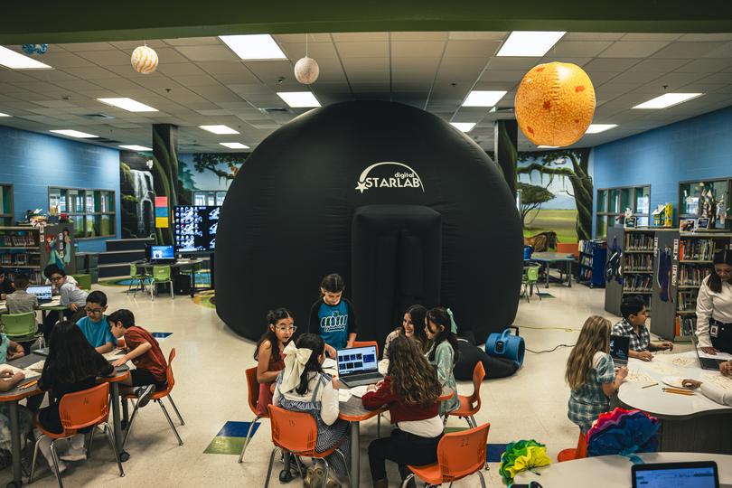 A pop-up planetarium at the Hudson Elementary School in Brownsville, Texas, on Feb. 22, 2024, a city near SpaceX’s launch site and the recipient of millions of dollars from the Musk Foundation.  (Meridith Kohut/The New York Times)