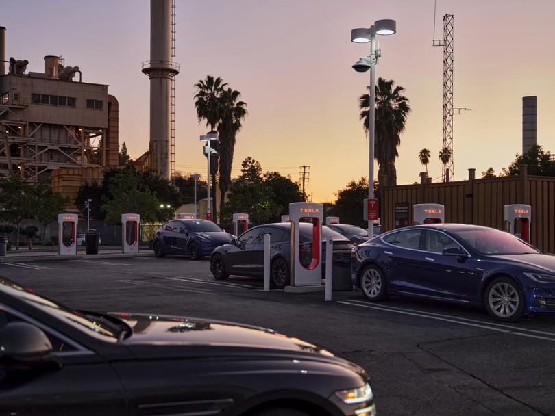 Teslas charge in the parking lot of the Arroyo EV Charging Depot in Pasadena, Calif., on Jan. 23, 2024. (Philip Cheung/The New York Times)