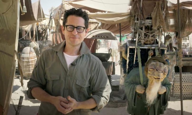 In this video grab made available by Lucasfilm Ltd. & TM on Thursday, May 22,  2014, J.J. Abrams, director of "Star Wars: Episode VII," talks to the fans from the movie set in the desert in Abu Dhabi, United Arab Emirates. Walt Disney Pictures announced Thursday, Nov. 6, that the movie previously known only as “Episode VII” has been dubbed “The Force Awakens.” Disney also said that principle photography has wrapped on the J.J. Abrams-directed sequel six months after beginning. The film will be released in December 2015. (AP Photo/Lucasfilm Ltd., File)