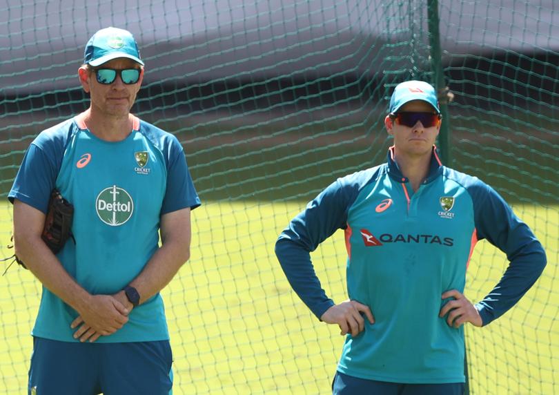 INDORE, INDIA - FEBRUARY 27: Australian coach Andrew McDonald and Steve Smith of Australia look on during an Australia Test squad training session at Holkare Stadium on February 27, 2023 in Indore, India. (Photo by Robert Cianflone/Getty Images)