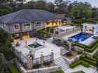 The palatial home has stunning gardens ideal for entertaining including a large pool and cabana.