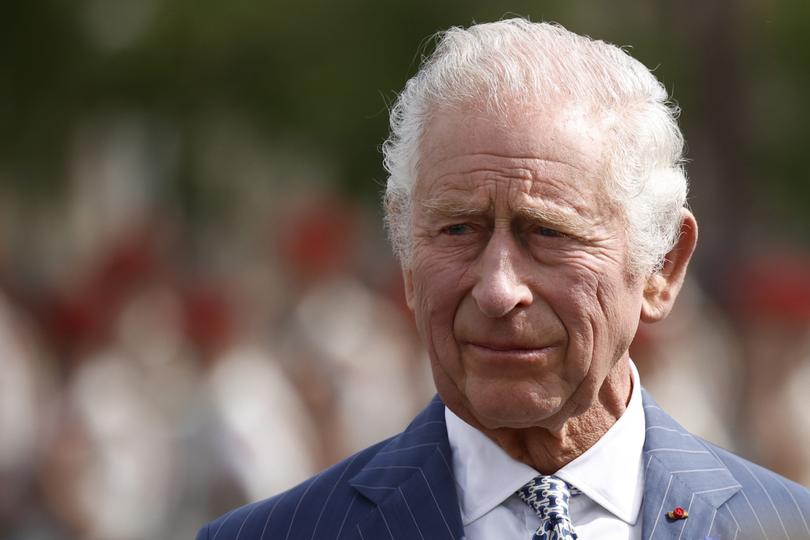 FILE - Britain's King Charles III attends a ceremony at the Arc de Triomphe in Paris, Wednesday, Sept. 20, 2023. King Charles III was in hospital to receive treatment for an enlarged prostate. Britain's prime minister says King Charles III’s cancer was caught early and the whole country is hoping for a speedy recovery. The remarks came as the monarch’s son Prince Harry reportedly flew from the U.S. to visit his father. Buckingham Palace announced Monday, Feb. 5, 2024 evening that the king has begun outpatient treatment for an undisclosed form of cancer.  ((Yoan Valat, Pool via AP, File)