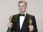 Britain's Christopher Nolan poses with Oscars for best director and best picture for Oppenheimer. (AP PHOTO)