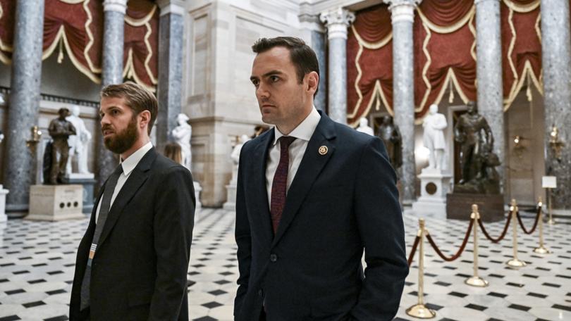 Rep. Mike Gallagher (R-Wis.), right, is one of the primary champions of the legislation.