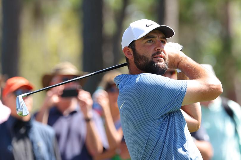 PONTE VEDRA BEACH, FLORIDA - MARCH 13: Scottie Scheffler of the United States plays his shot from the sixth tee during a practice round prior to THE PLAYERS Championship  on the Stadium Course at TPC Sawgrass on March 13, 2024 in Ponte Vedra Beach, Florida. (Photo by Kevin C. Cox/Getty Images)