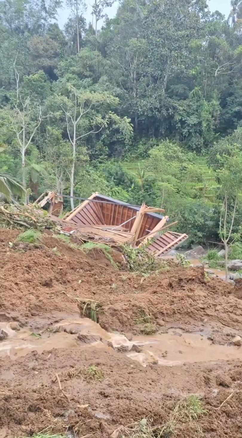 An Australian woman is among two tourists who have been killed in Bali after heavy rain triggered a landslide that swept away their villa. sekilasinfo_tabanan/instagram