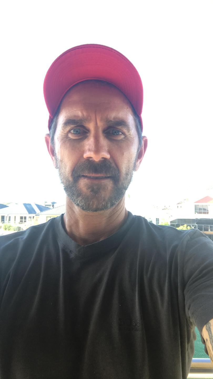 Justin Langer grows a beard on his annual “hippie break”. 