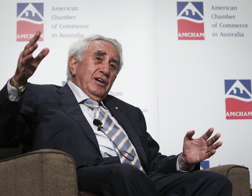 Harry Triguboff, chief executive officer of Meriton Pty., speaks at a business lunch for the American Chamber of Commerce (AMCHAM) in Sydney, Australia, on Friday, Oct. 21, 2011. Triguboff, founder and managing director of closely-held Meriton Pty, Australia's biggest apartment developer, comments on Chinese demand for Australian homes, the Reserve Bank of Australia's monetary policy and his expectation for the housing market. Triguboff spoke at an event in Sydney. Photographer: Ian Waldie/Bloomberg *** Local Caption *** Harry Triguboff