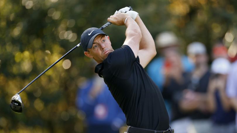 Rory McIlroy leads The Players Championship after getting in a dispute over a ball drop when his shot went in the drink.