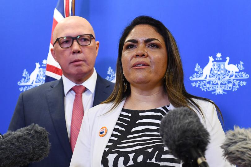 Opposition Leader Peter Dutton and Shadow Minister for Indigenous Australians Senator Jacinta Price address the media during a press conference in Brisbane, Saturday, October 14, 2023. Australians today voted against an Indigenous voice in the country's constitution. (AAP Image/Jono Searle) NO ARCHIVING