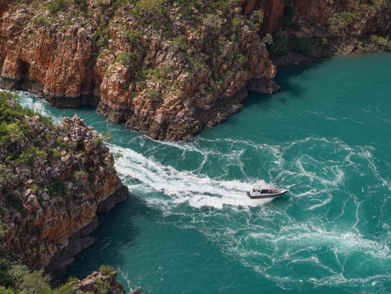 A boat passing through the Horizontal Falls in the Kimberley.