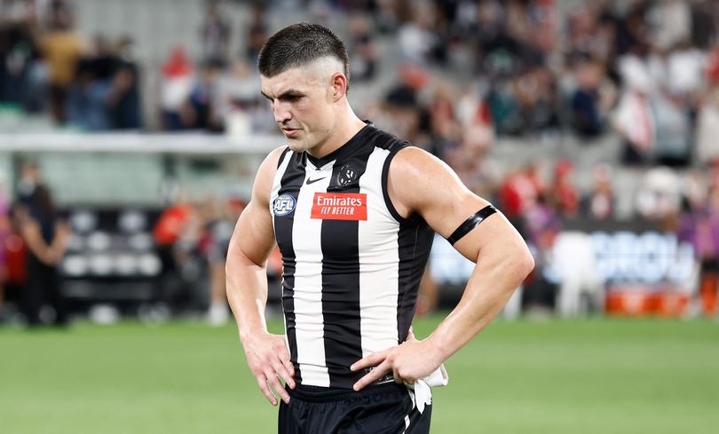 Brayden Maynard of the Magpies looks dejected after a loss.