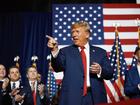 Former President Donald Trump speaks at his caucus night event at the Iowa Events Centre.