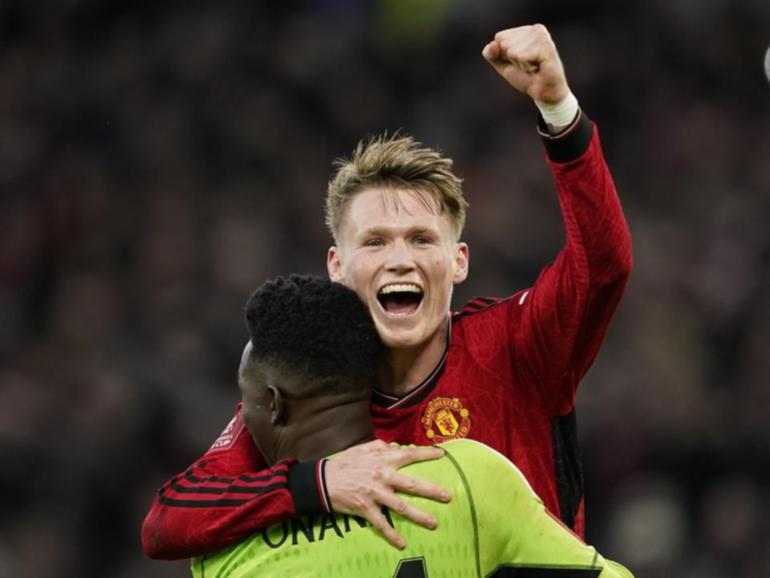 Scott McTominay hugs goalie Andre Onana after Man Utd's amazing FA Cup win over Liverpool. (AP PHOTO)