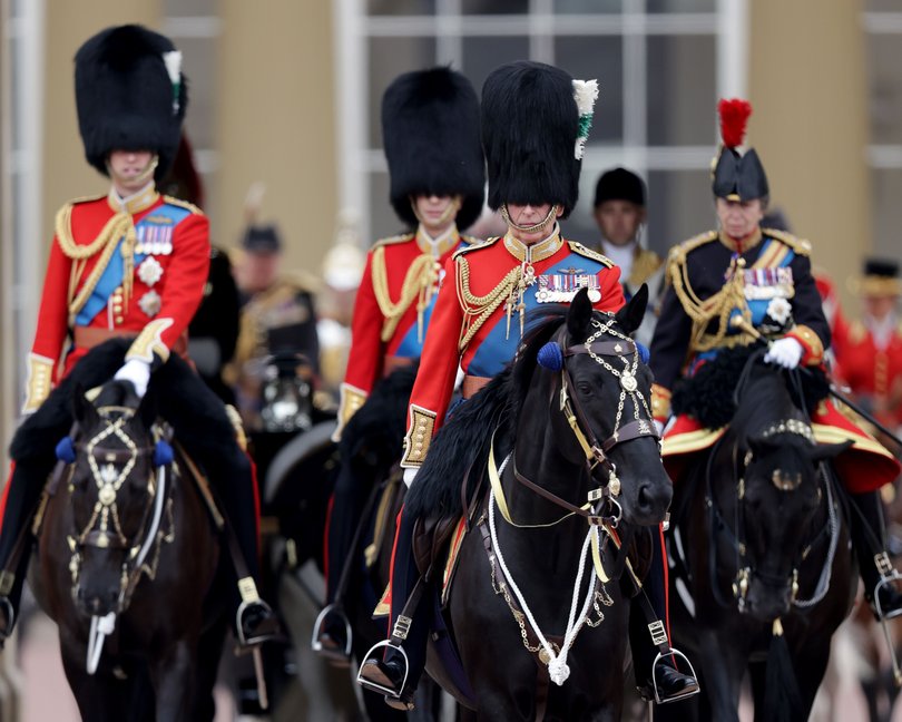 Prince William, Prince Edward, King Charles and Princess Anne leave Buckingham Palace on horseback during Trooping the Colour in 2023.